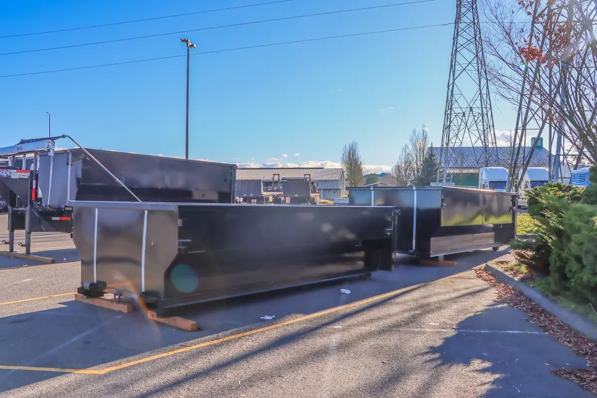 Roll-off dumpster ready for waste disposal at job site for 4 Yard Dumpster Rental in Killingly